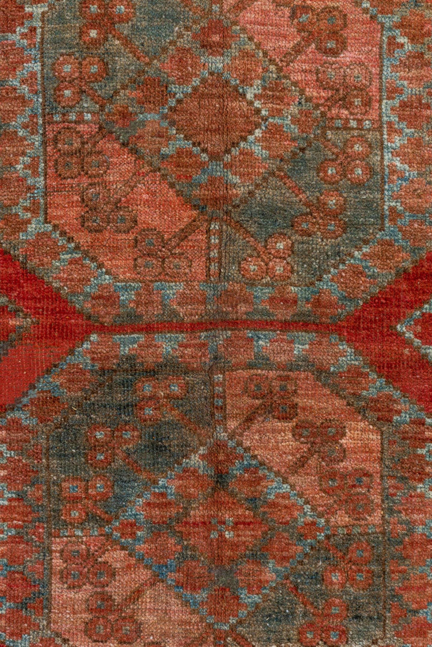 7' x 8' one-of-a-kind handmade vintage Afghan rug. Color palette: rust, terra cotta, dusty rose, sage, taupe, brown