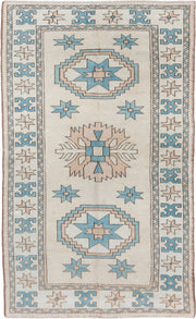 4' x 7' one-of-a-kind handmade vintage Oushak rug. Color palette: ivory, sky blue, beige, taupe, camel, light blue, gray