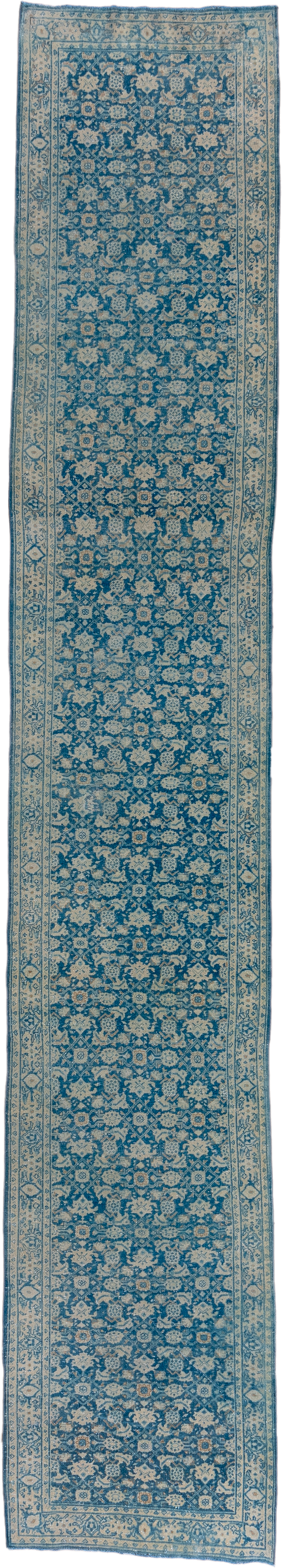 2' x 16' one-of-a-kind handmade vintage Tabriz runner rug. Color palette: blue, ivory, sky blue, navy, cream, light blue