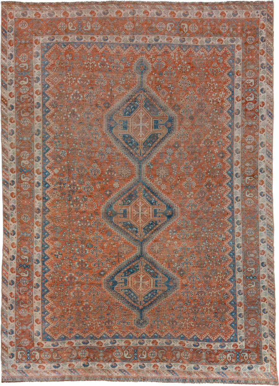 7' x 10' one-of-a-kind handmade vintage Shiraz large size rug. Color palette: terra cotta, ivory, slate, rust, blue, camel