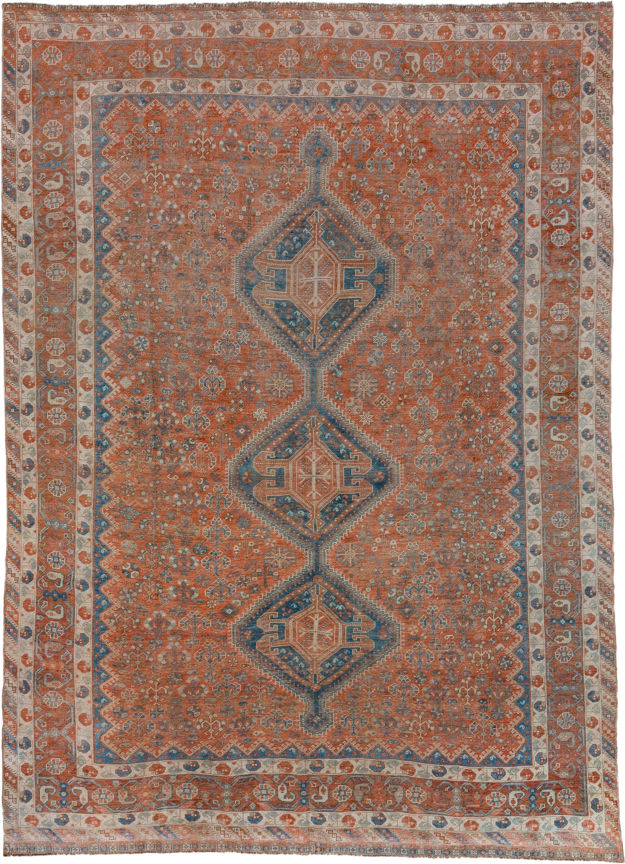 7' x 10' one-of-a-kind handmade vintage Shiraz large size rug. Color palette: terra cotta, ivory, slate, rust, blue, camel