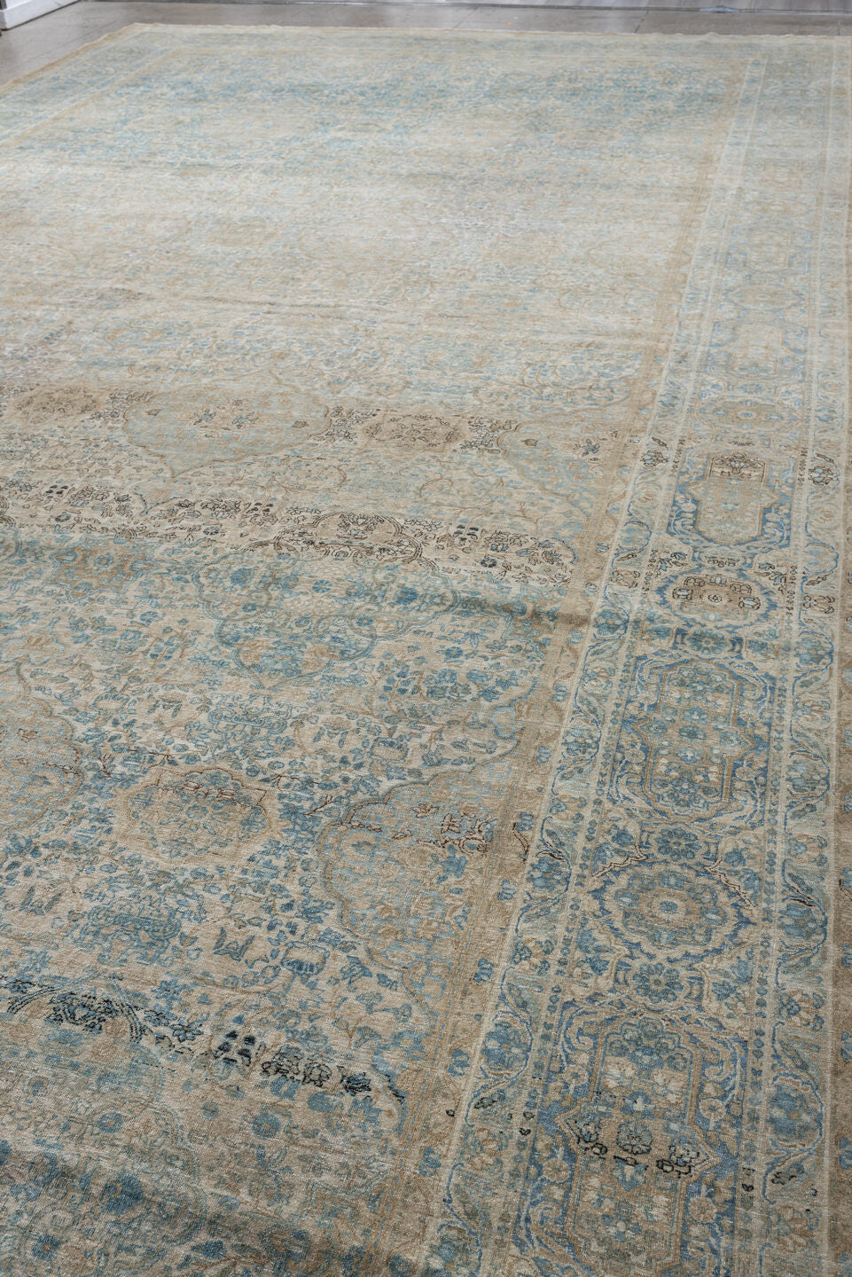 12' x 23' one-of-a-kind handmade vintage Kerman oversize rug. Color palette: ivory, sky blue, taupe, beige, slate, sand