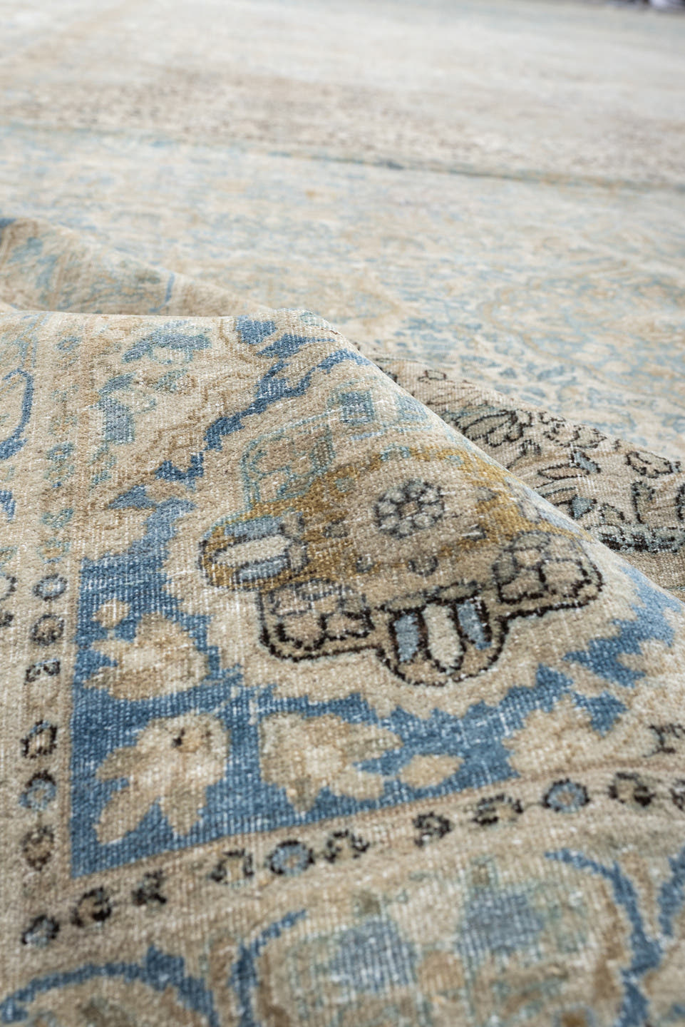 12' x 23' one-of-a-kind handmade vintage Kerman oversize rug. Color palette: ivory, sky blue, taupe, beige, slate, sand