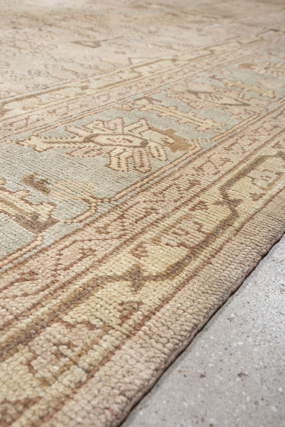12' x 18' one-of-a-kind handmade antique Oushak oversize rug. Color palette: ivory, taupe, pale blue, faded terracotta