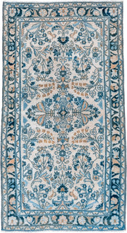 3' x 6' one-of-a-kind handmade vintage Lilian small size rug. Color palette: ivory, sky blue, teal, camel, navy, taupe