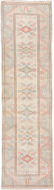 2' x 9' one-of-a-kind handmade vintage Oushak runner rug. Color palette: ivory, pale blue, blush, taupe, cream, peach