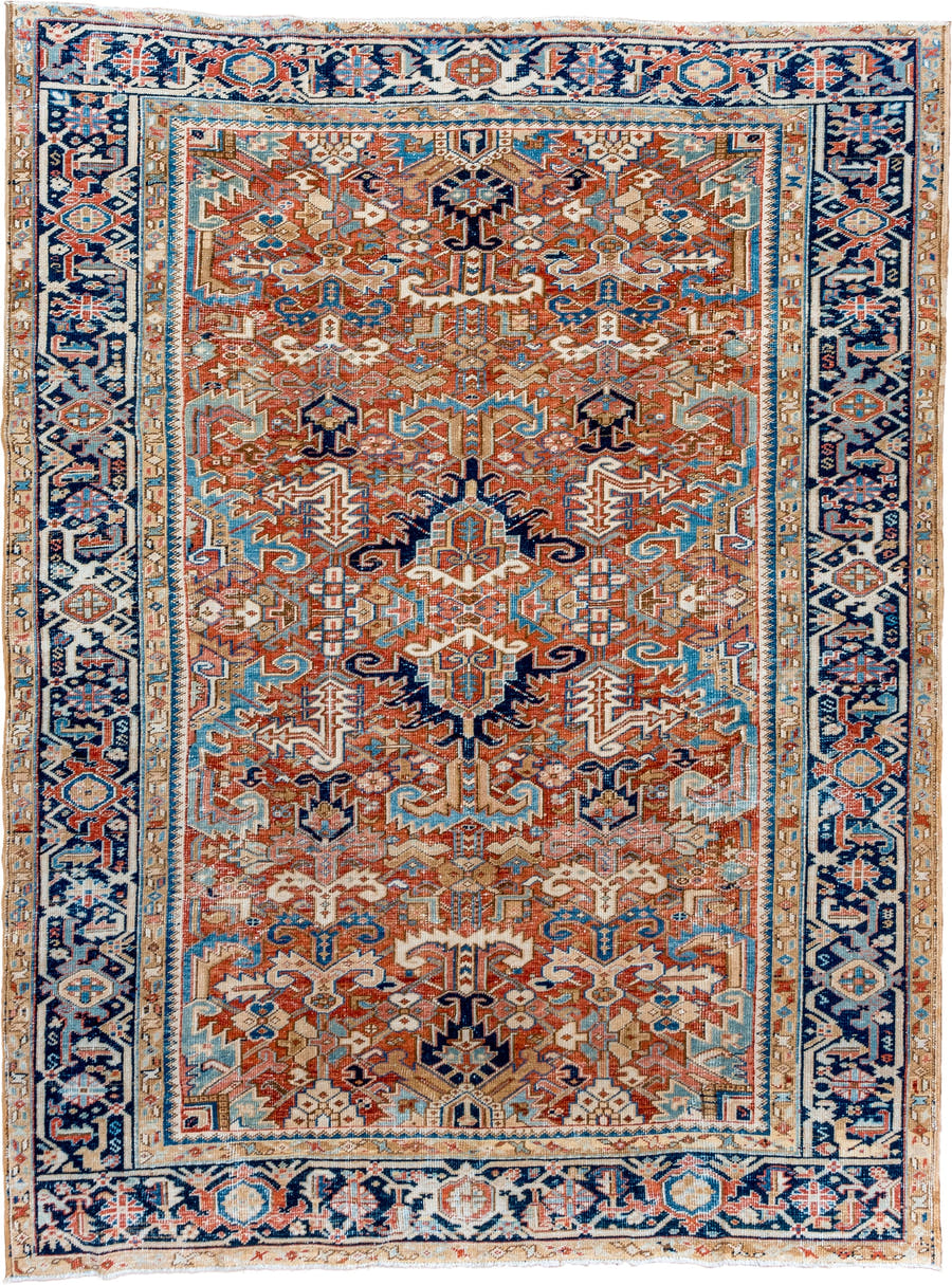 7' x 10' one-of-a-kind handmade vintage Heriz large size rug. Color palette: terra cotta, navy, ivory, sky blue, camel, rust