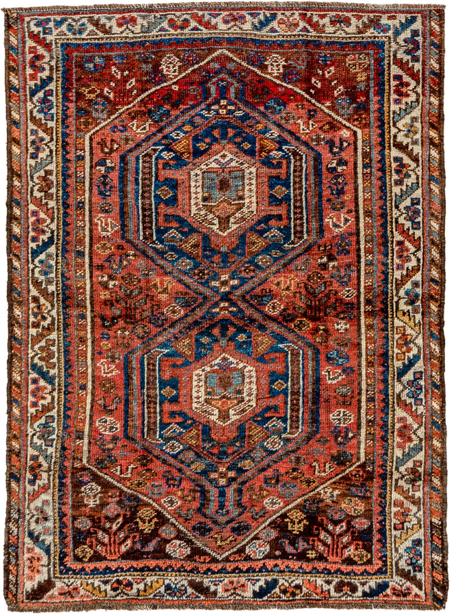3' x 4' one-of-a-kind handmade vintage Shiraz small size rug. Color palette: rust, ivory, navy, brown, sky_blue, coral