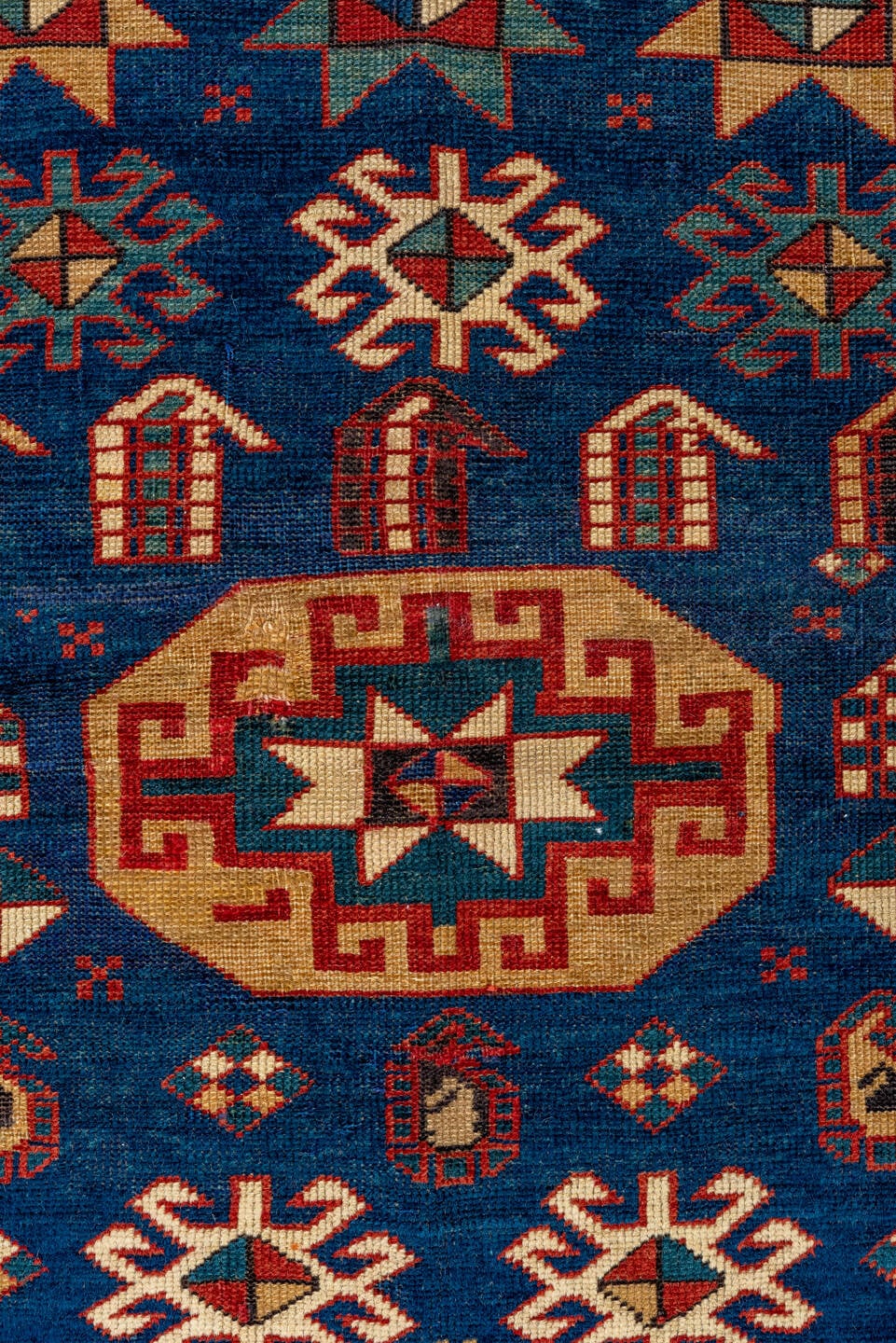 3' x 4' one-of-a-kind handmade vintage Shirvan small size rug. Color palette: blue, ivory, rust, brown, crimson, teal, camel