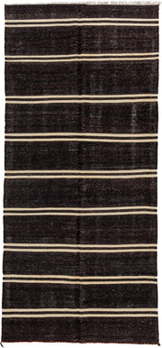 5' x 11' one-of-a-kind handmade vintage rug. Color palette: charcoal, ivory, ebony, gray, black