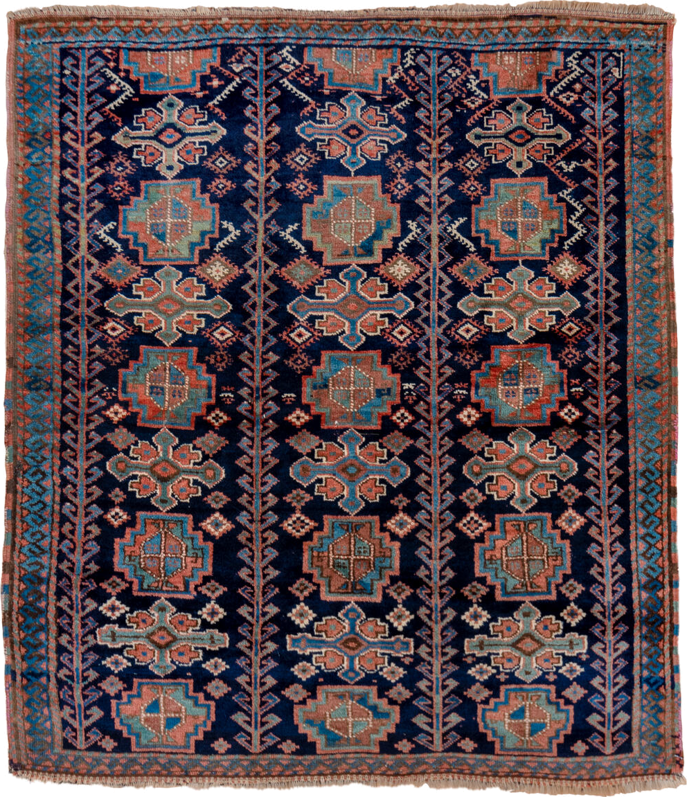 4' x 5' one-of-a-kind handmade vintage Kurd small size rug. Color palette: navy, turquoise, rust, ivory, coral, camel, blue