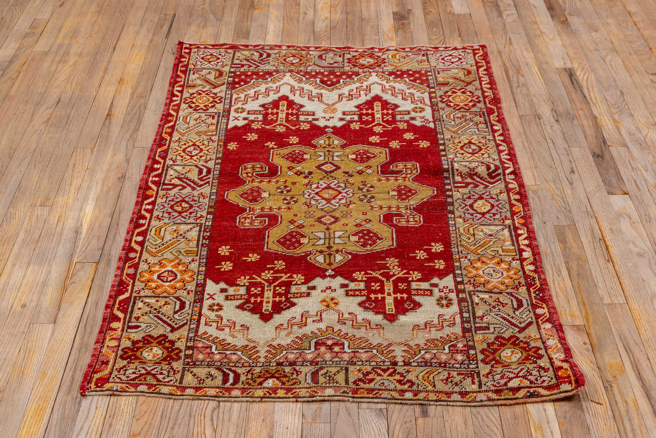3' x 5' one-of-a-kind handmade vintage Oushak small size rug. Color palette: red, ivory, camel, rust, terra cotta, gold