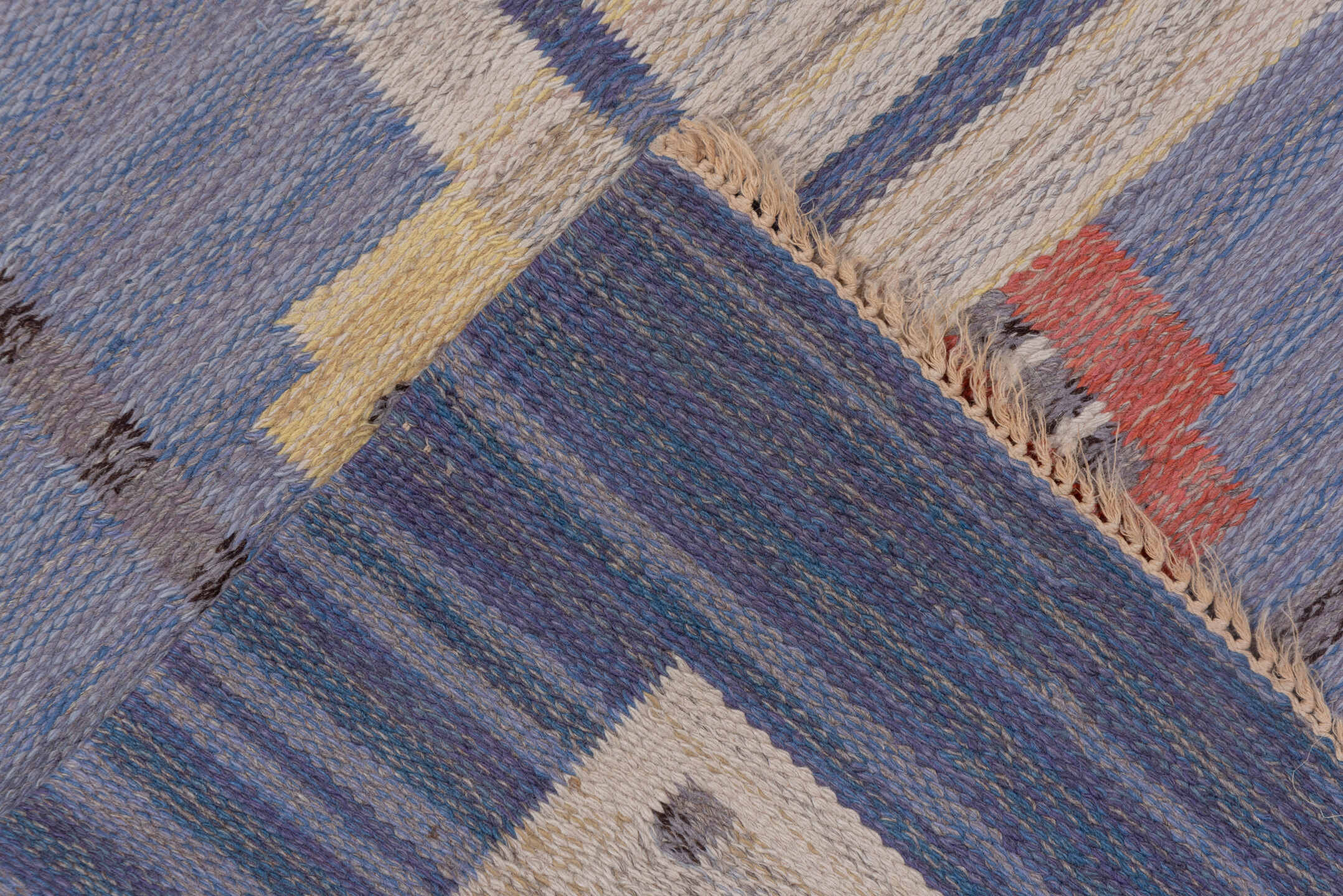 6' x 10' one-of-a-kind handmade vintage Rollaken large size rug. Color palette: ivory, slate blue, periwinkle, cream
