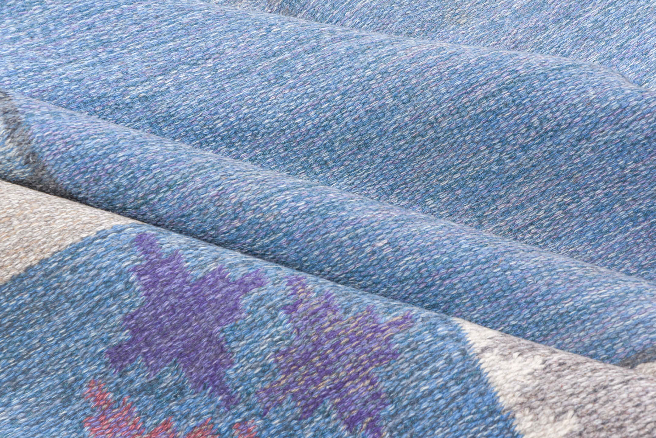 6' x 9' one-of-a-kind handmade vintage Rollaken medium size rug. Color palette: blue, ivory, taupe, lavender, rose, slate