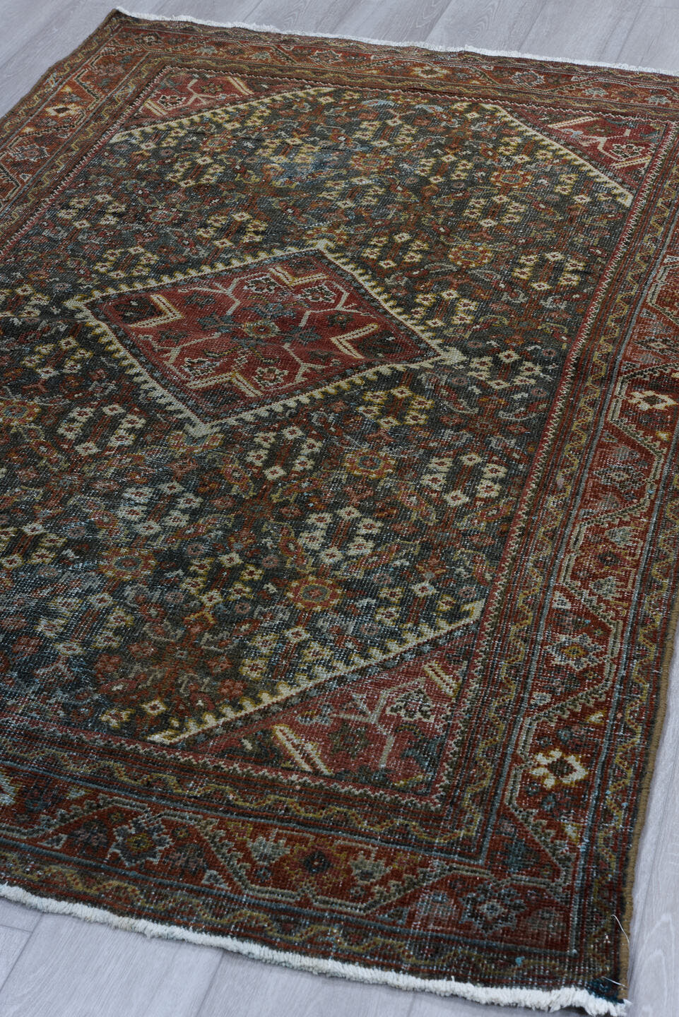 4' x 6' one-of-a-kind handmade vintage Mahal small size rug. Color palette: charcoal, rust, ivory, brick, slate, rose, taupe