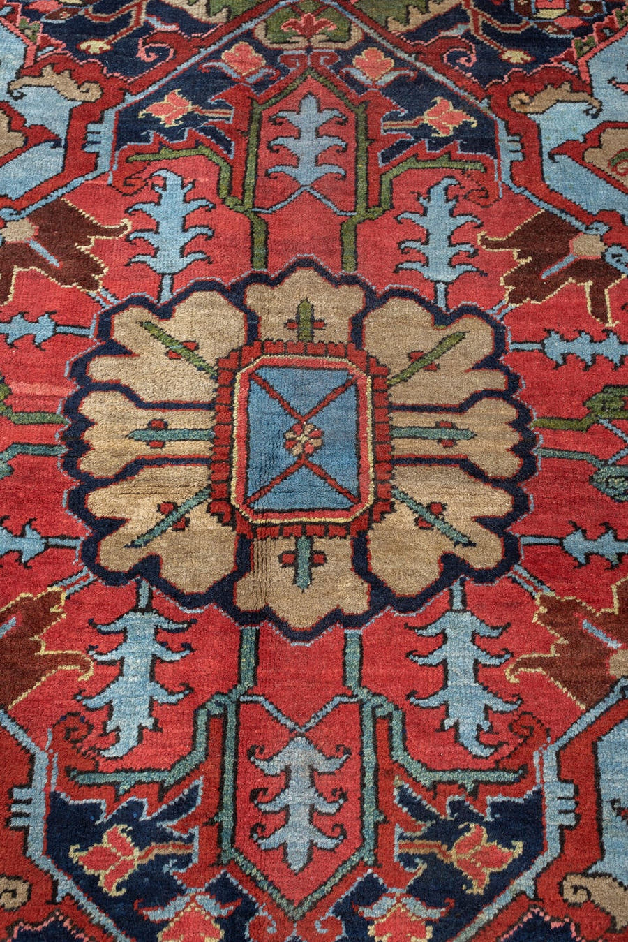 12' x 15' one-of-a-kind handmade antique Heriz oversize rug. Color palette: brick red, navy, turquoise, ivory, sage, coral