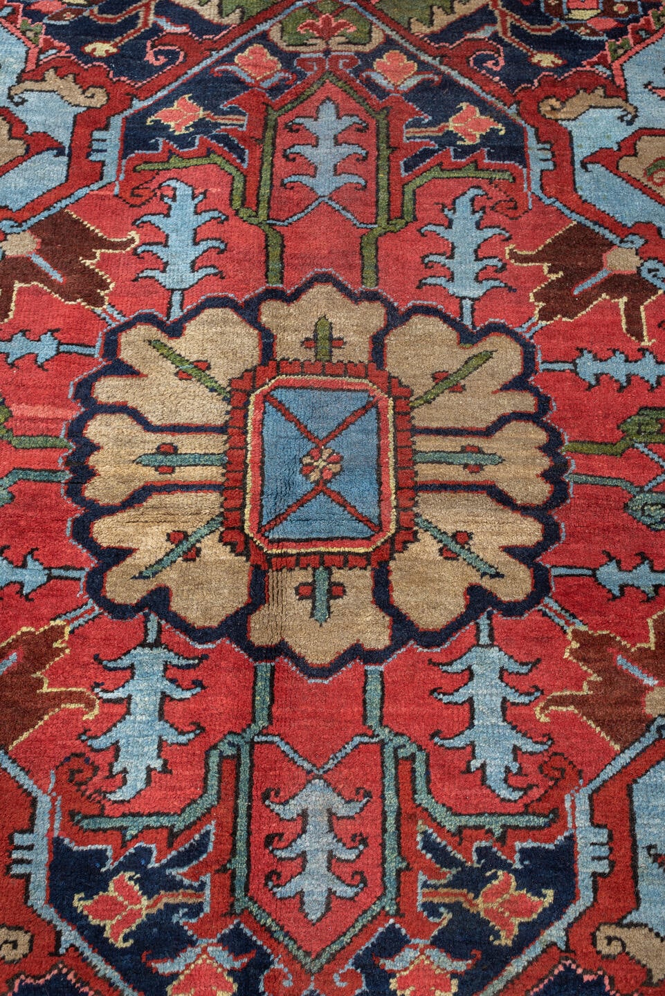 12' x 15' one-of-a-kind handmade antique Heriz oversize rug. Color palette: brick red, navy, turquoise, ivory, sage, coral