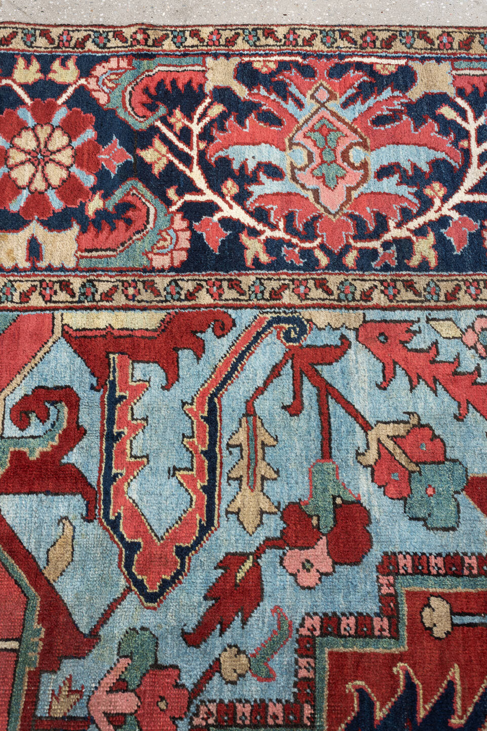 12' x 15' one-of-a-kind handmade antique Heriz oversize rug. Color palette: brick red, navy, turquoise, ivory, sage, coral