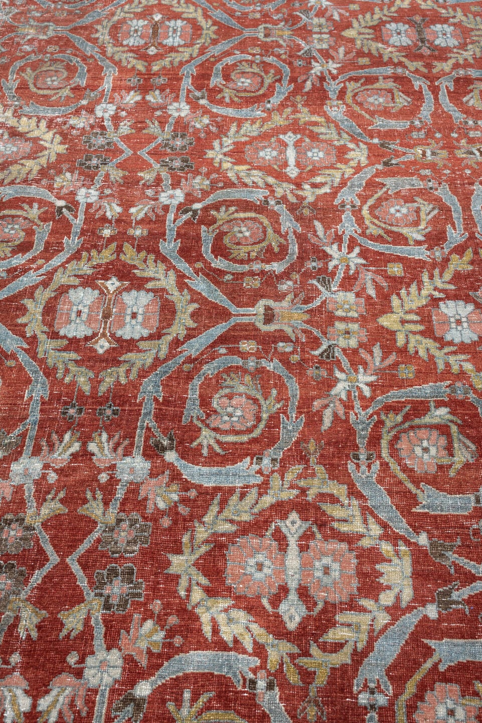 11' x 18' one-of-a-kind handmade antique Bidjar oversize rug. Color palette: terracotta, powder blue, ivory, rust, sage