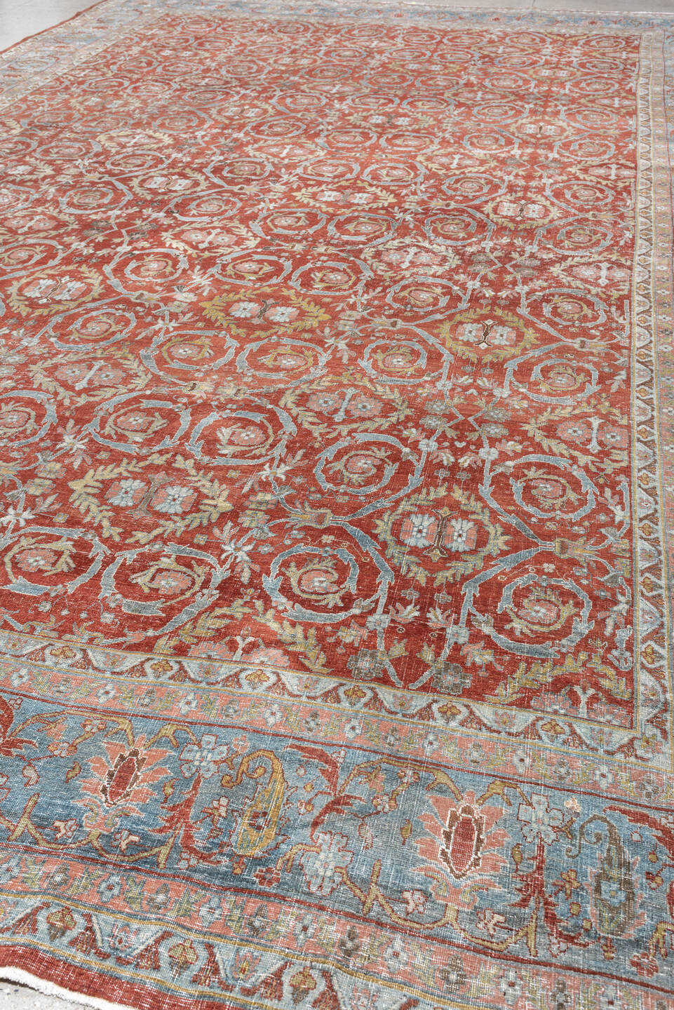 11' x 18' one-of-a-kind handmade antique Bidjar oversize rug. Color palette: terracotta, powder blue, ivory, rust, sage
