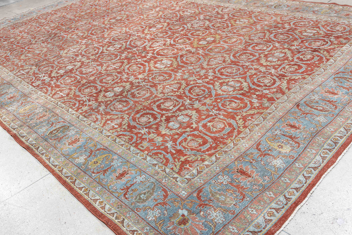 11' x 18' one-of-a-kind handmade antique Bidjar oversize rug. Color palette: terracotta, powder blue, ivory, rust, sage
