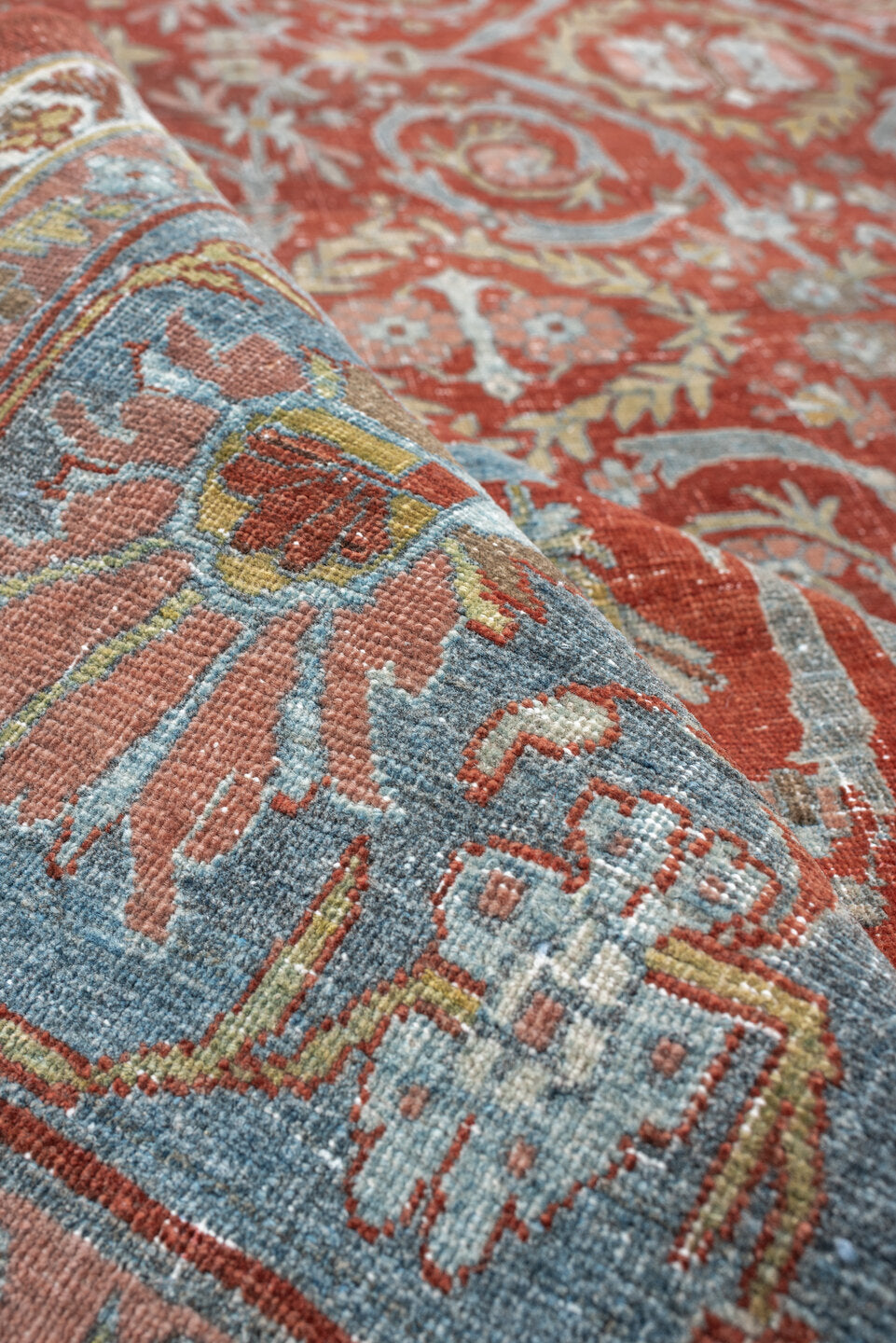 11' x 18' one-of-a-kind handmade antique Bidjar oversize rug. Color palette: terracotta, powder blue, ivory, rust, sage