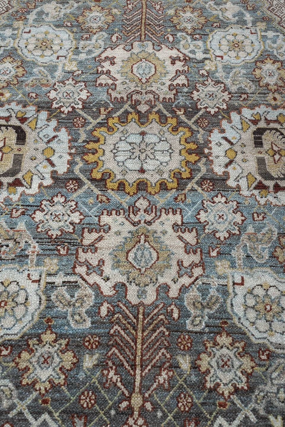 11' x 19' one-of-a-kind handmade antique Bibikabad oversize rug. Color palette: ivory, taupe, ebony, powder blue, rust
