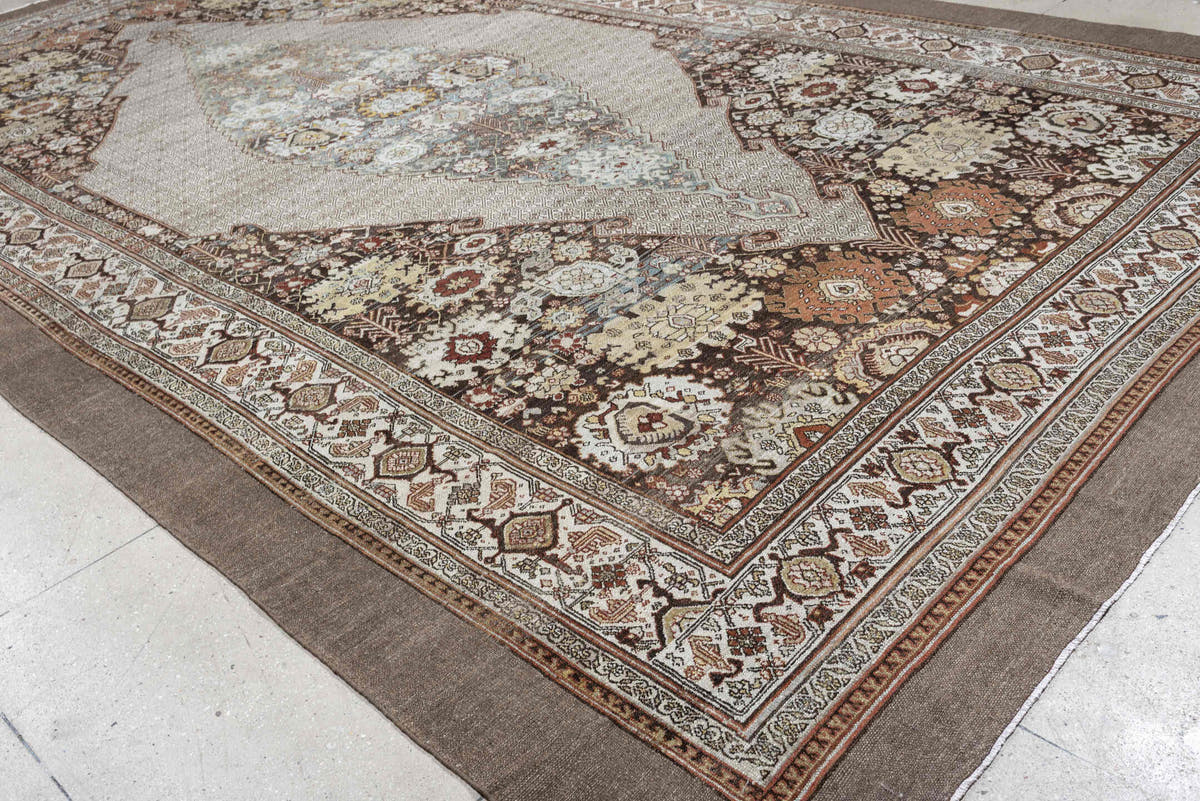 11' x 19' one-of-a-kind handmade antique Bibikabad oversize rug. Color palette: ivory, taupe, ebony, powder blue, rust