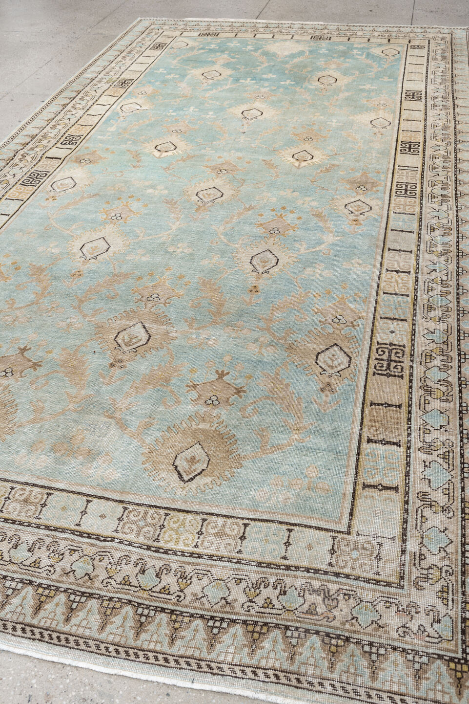 6' x 12' one-of-a-kind handmade antique Khotan large size rug. Color palette: aqua, ivory, beige, tan, taupe, charcoal