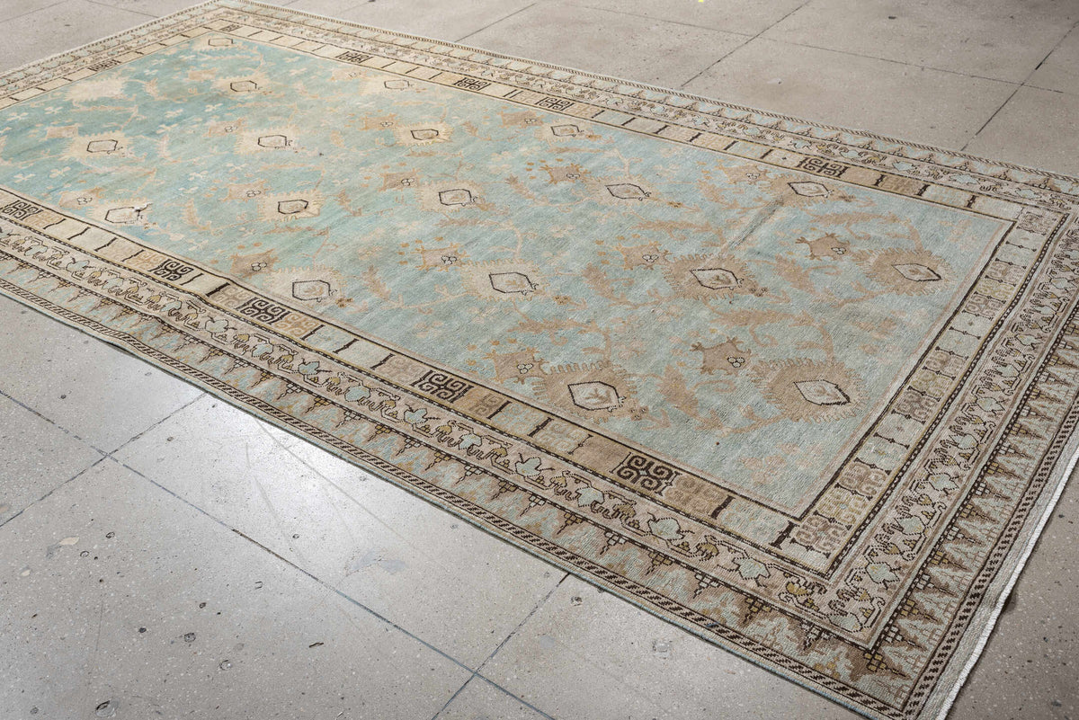 6' x 12' one-of-a-kind handmade antique Khotan large size rug. Color palette: aqua, ivory, beige, tan, taupe, charcoal