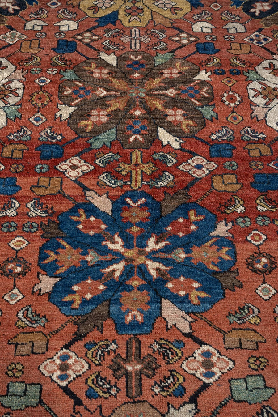 8' x 12' one-of-a-kind handmade antique Sultanabad large size rug. Color palette: terracotta, navy, ivory, camel, sage, rust