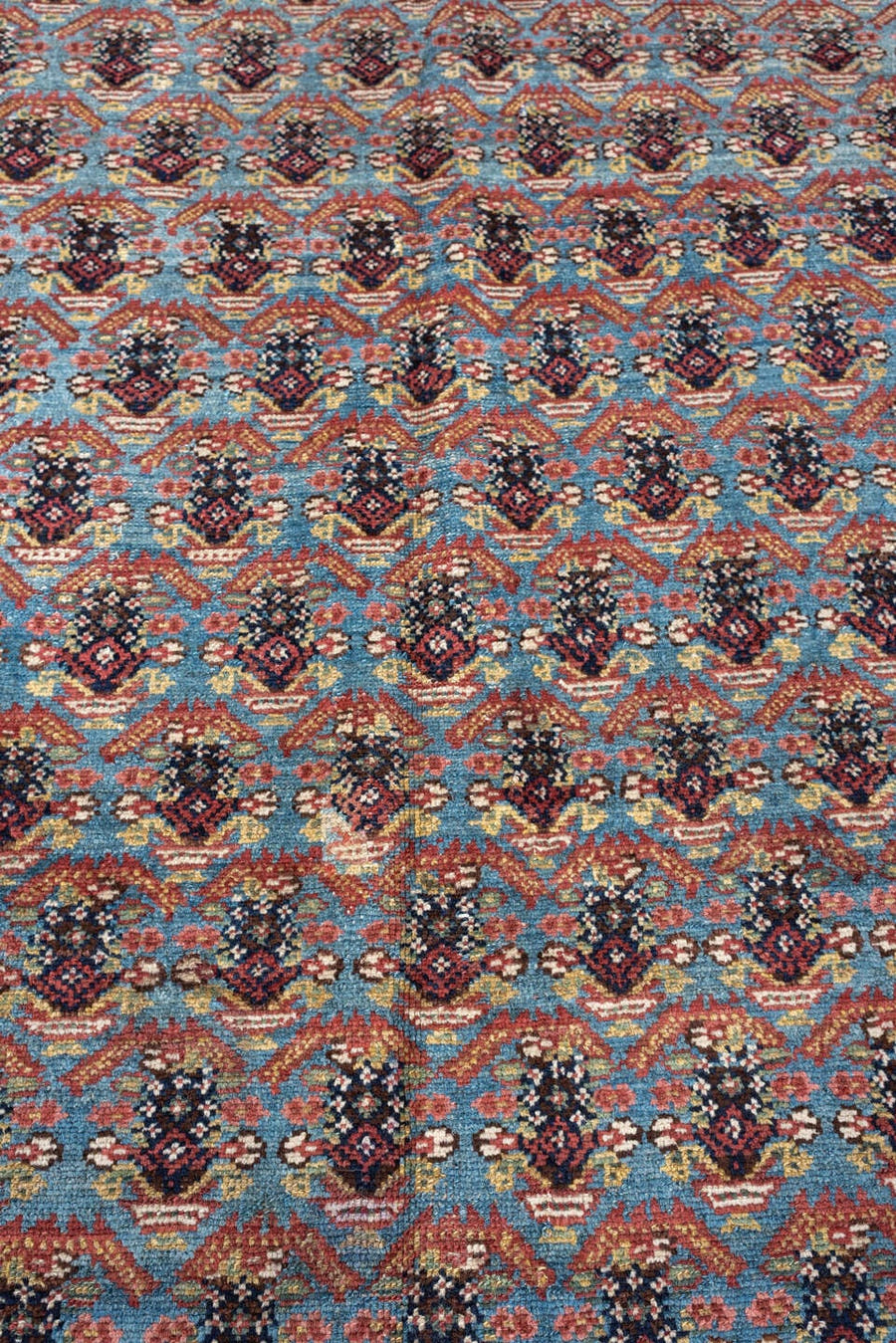 5' x 10' one-of-a-kind handmade antique Malayer rug. Color palette: turquoise, madder red, navy, ivory, saffron, charcoal