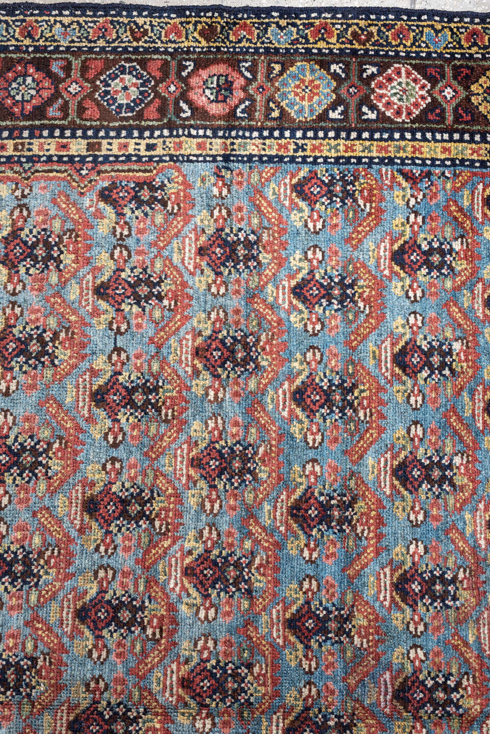 5' x 10' one-of-a-kind handmade antique Malayer rug. Color palette: turquoise, madder red, navy, ivory, saffron, charcoal