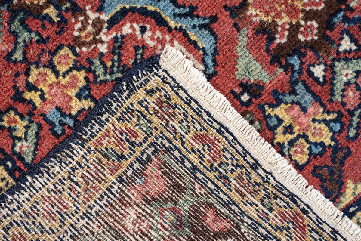 5' x 10' one-of-a-kind handmade antique Malayer rug. Color palette: turquoise, madder red, navy, ivory, saffron, charcoal
