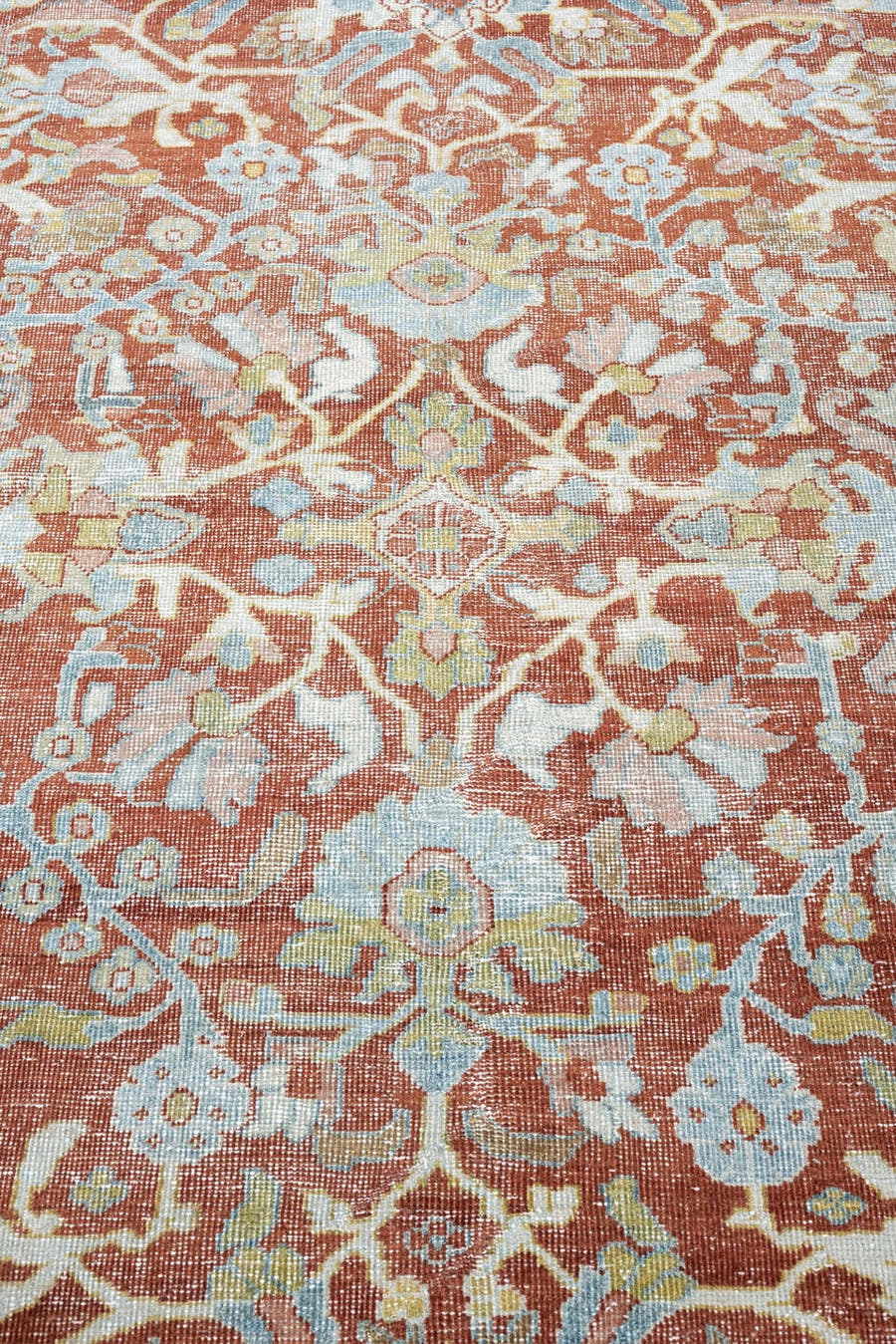9' x 13' one-of-a-kind handmade antique Mahal large size rug. Color palette: terracotta, pale blue, ivory, sage, rust