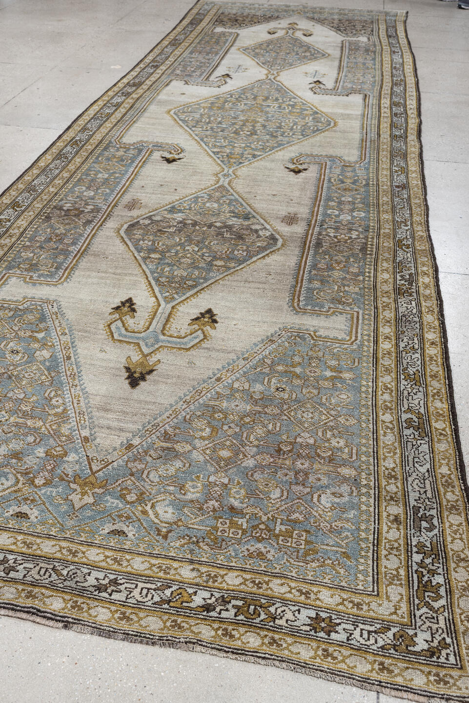 5' x 17' one-of-a-kind handmade antique Malayer rug. Color palette: ivory, blue gray, taupe, ochre, camel, charcoal, brown