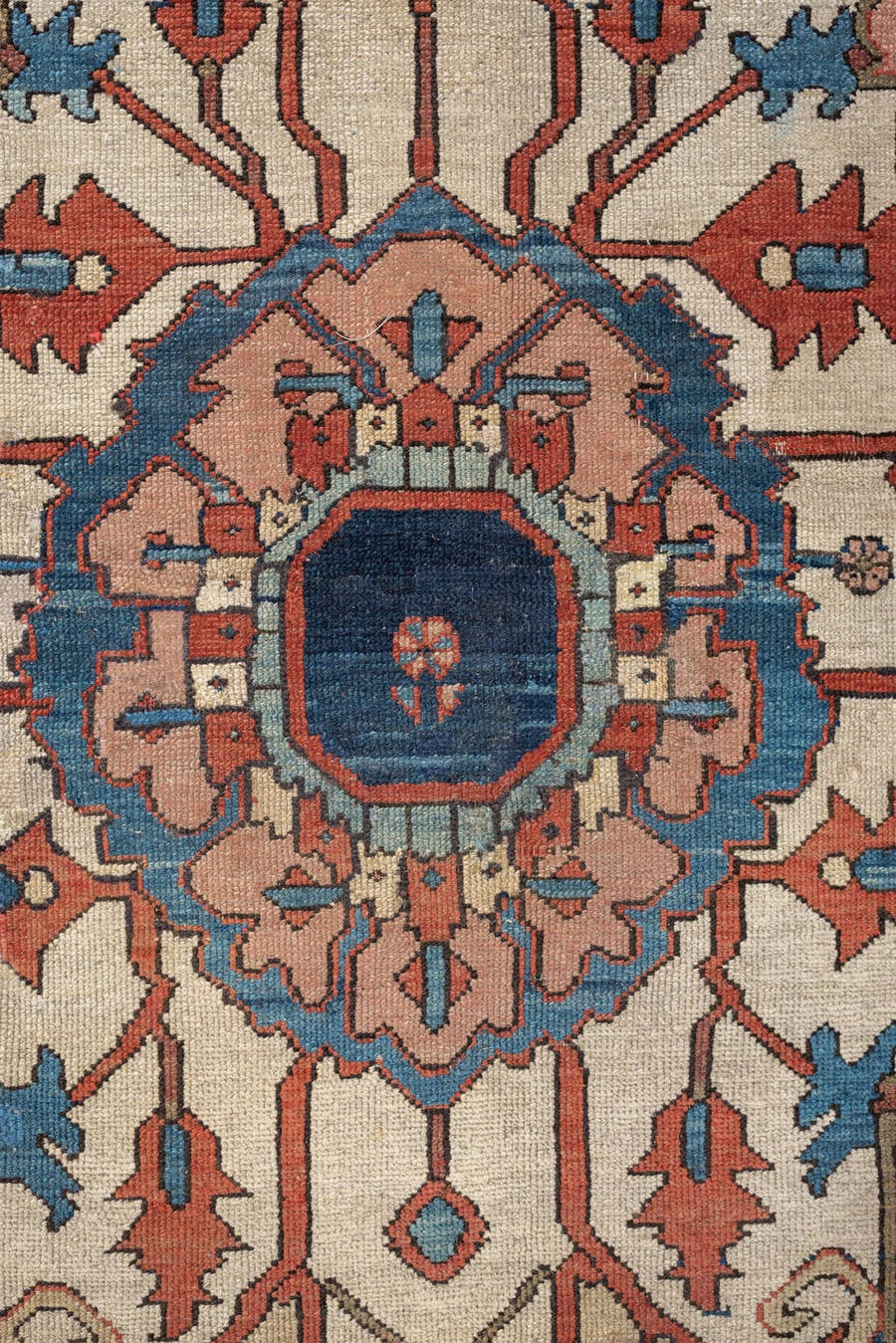 11' x 16' one-of-a-kind handmade antique Serapi oversize rug. Color palette: terracotta, navy, ivory, sky blue, camel, rose
