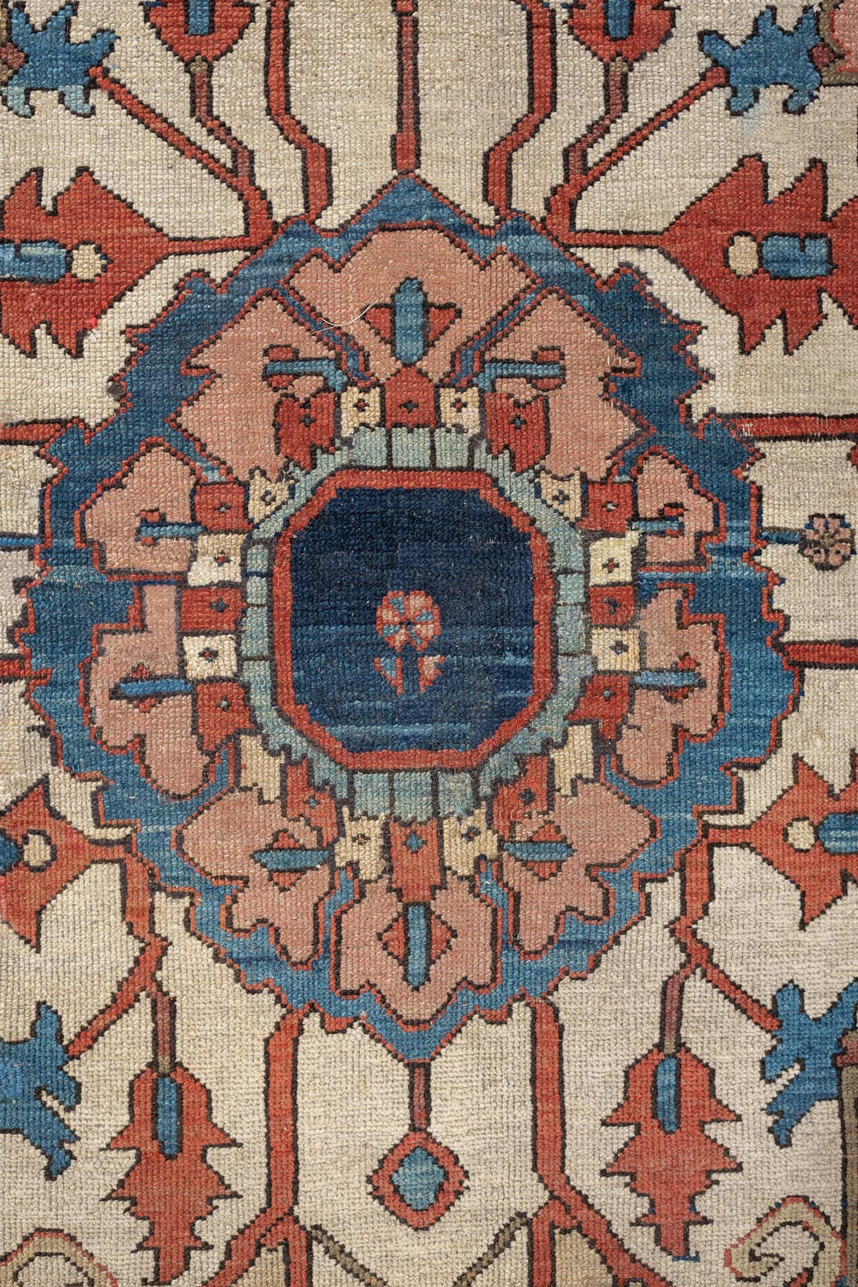 11' x 16' one-of-a-kind handmade antique Serapi oversize rug. Color palette: terracotta, navy, ivory, sky blue, camel, rose