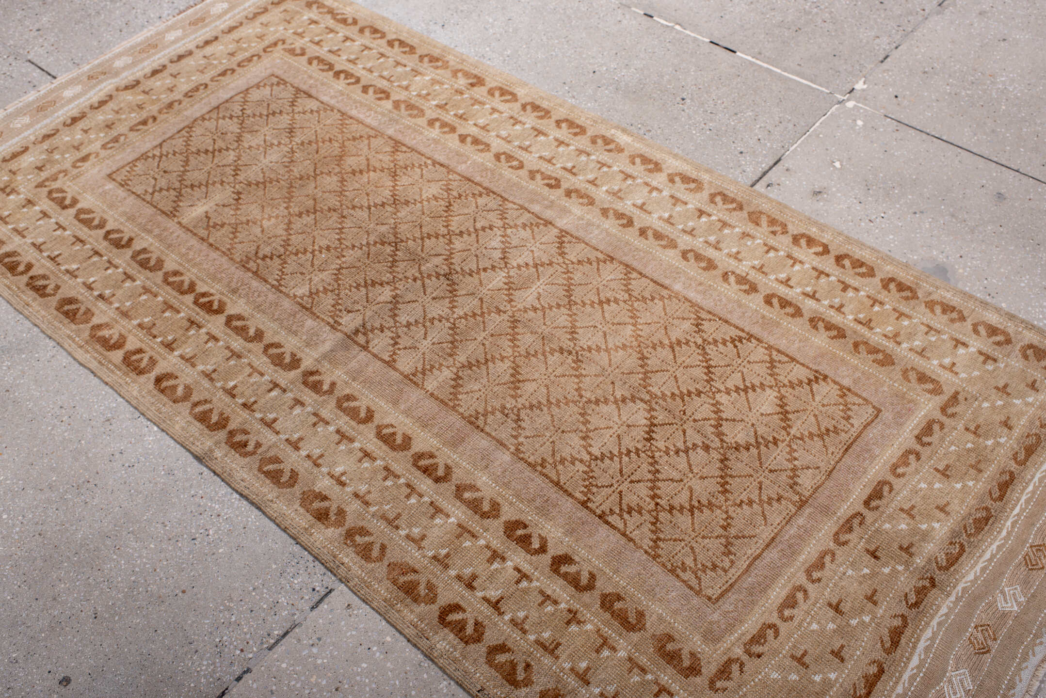3' x 6' one-of-a-kind handmade vintage Belouch runner rug. Color palette: camel, beige, ivory, tan, taupe, gray