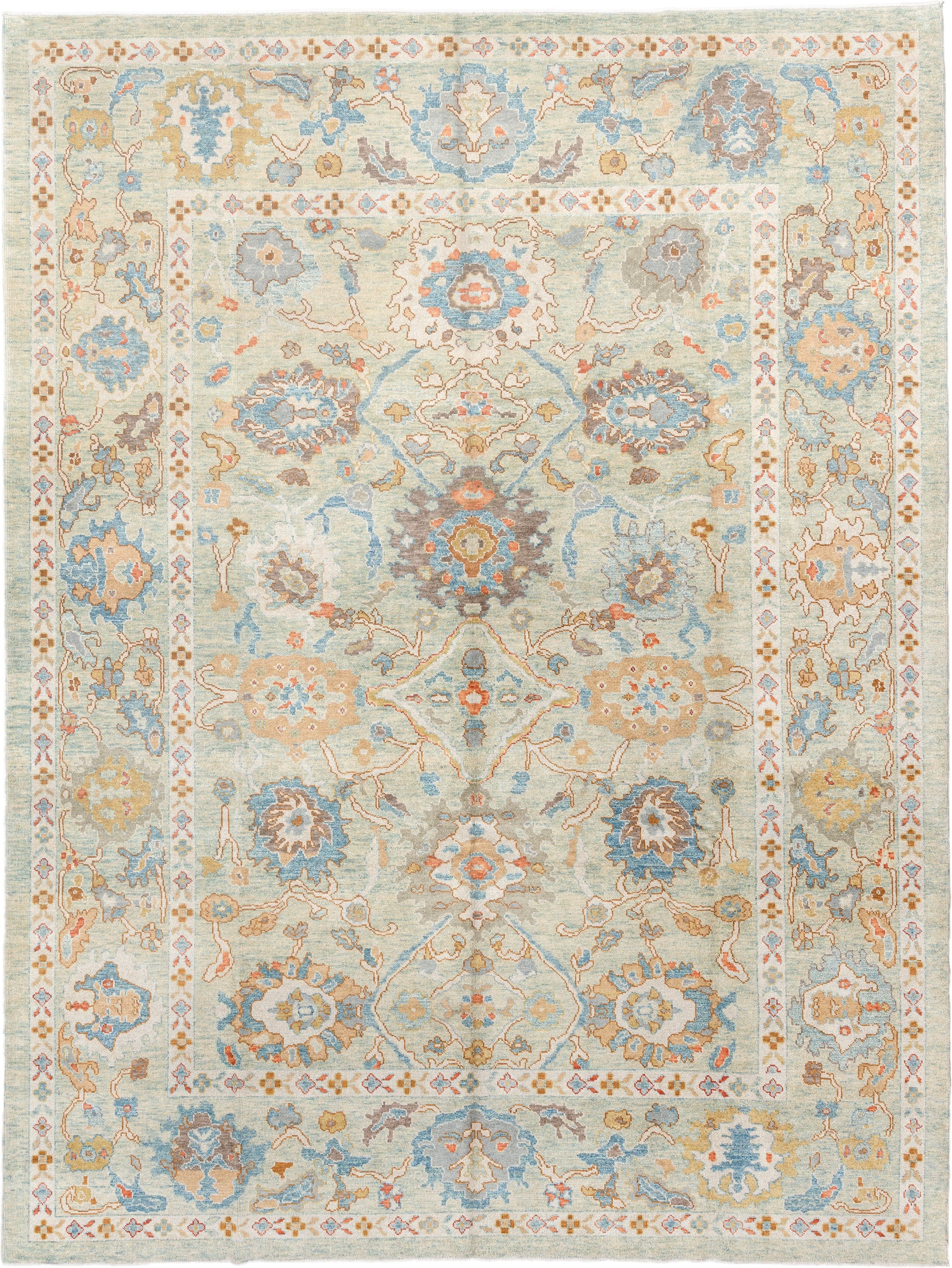 9' x 12' one-of-a-kind handmade vintage Sultanabad large size rug. Color palette: ivory, sky blue, taupe, terracotta, camel