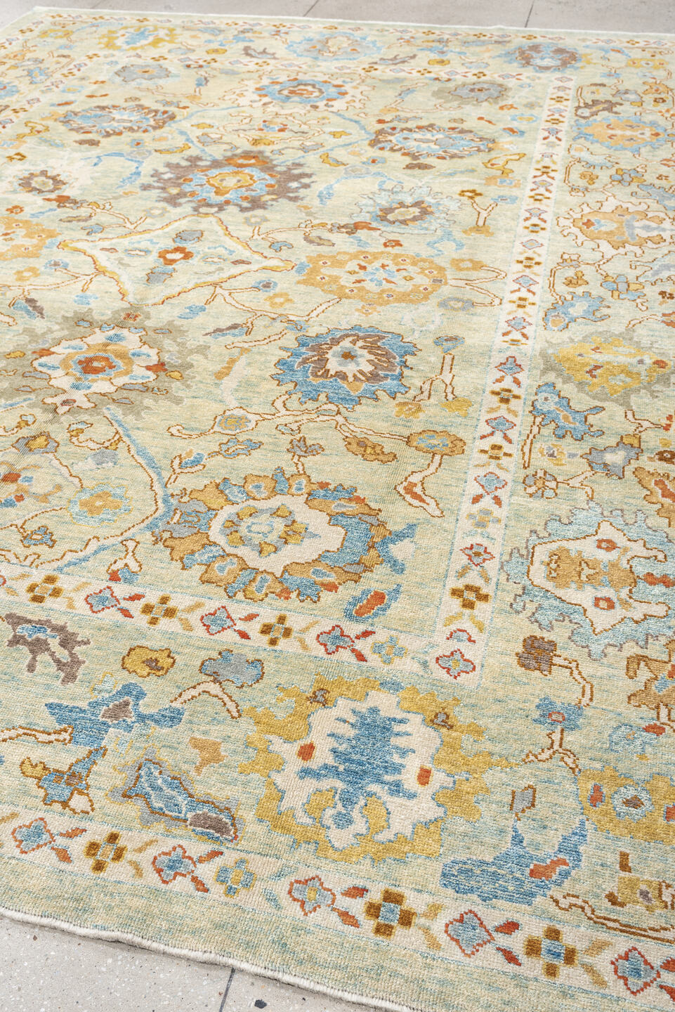 9' x 12' one-of-a-kind handmade vintage Sultanabad large size rug. Color palette: ivory, sky blue, taupe, terracotta, camel