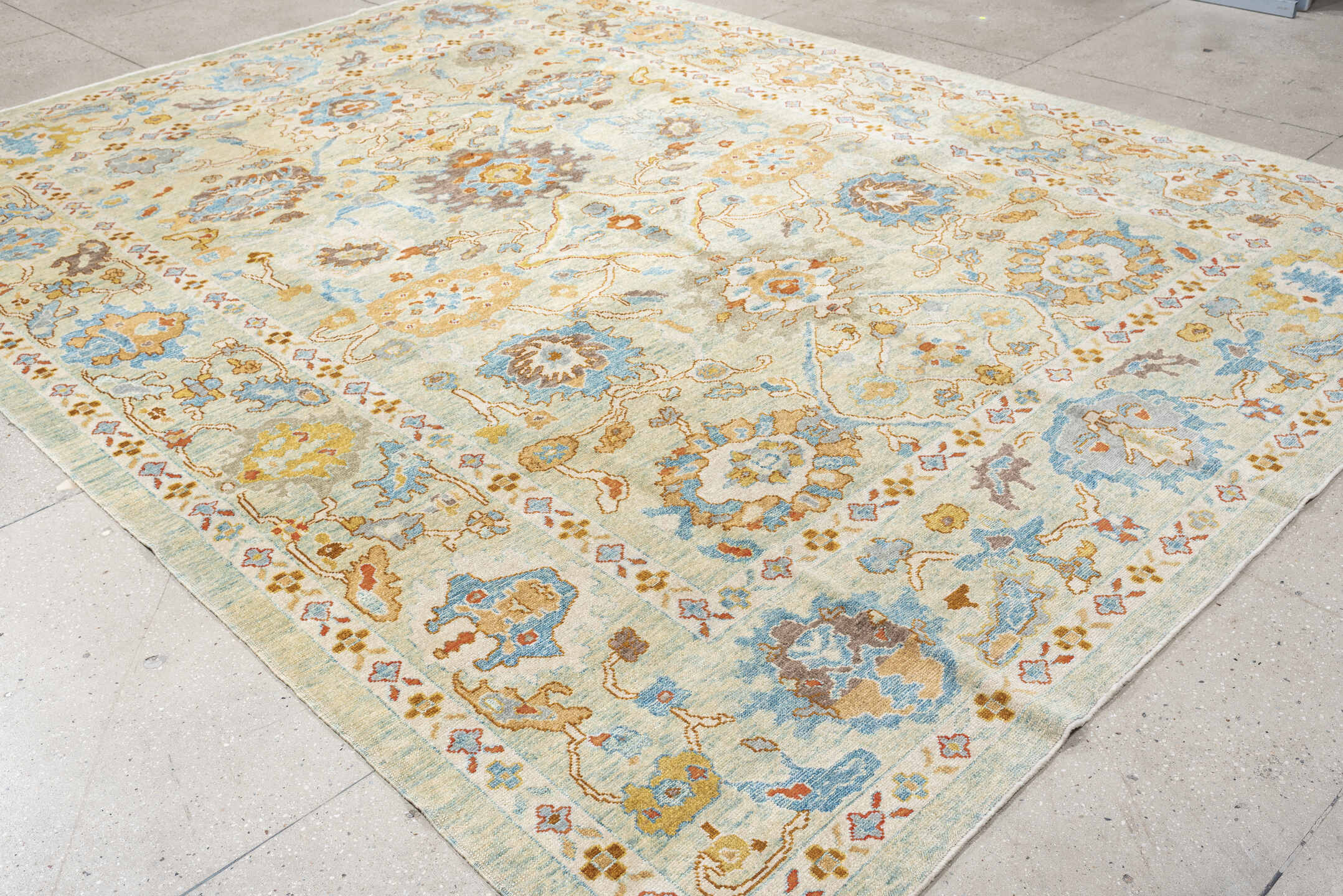 9' x 12' one-of-a-kind handmade vintage Sultanabad large size rug. Color palette: ivory, sky blue, taupe, terracotta, camel