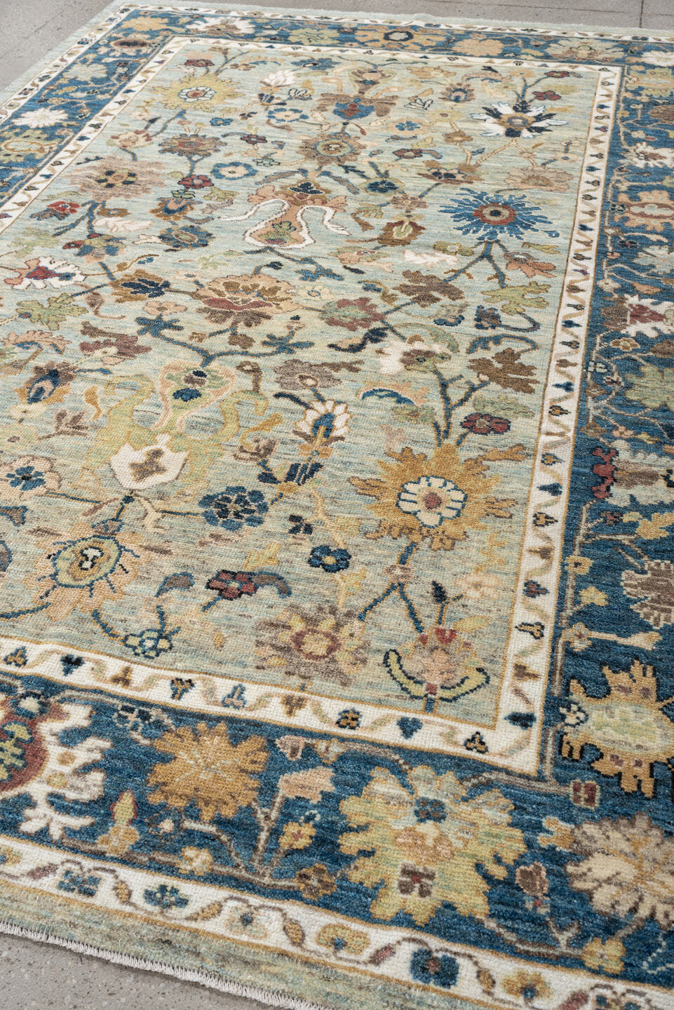 6' x 9' one-of-a-kind handmade vintage Sultanabad large size rug. Color palette: light blue, navy, ivory, taupe, beige, sage
