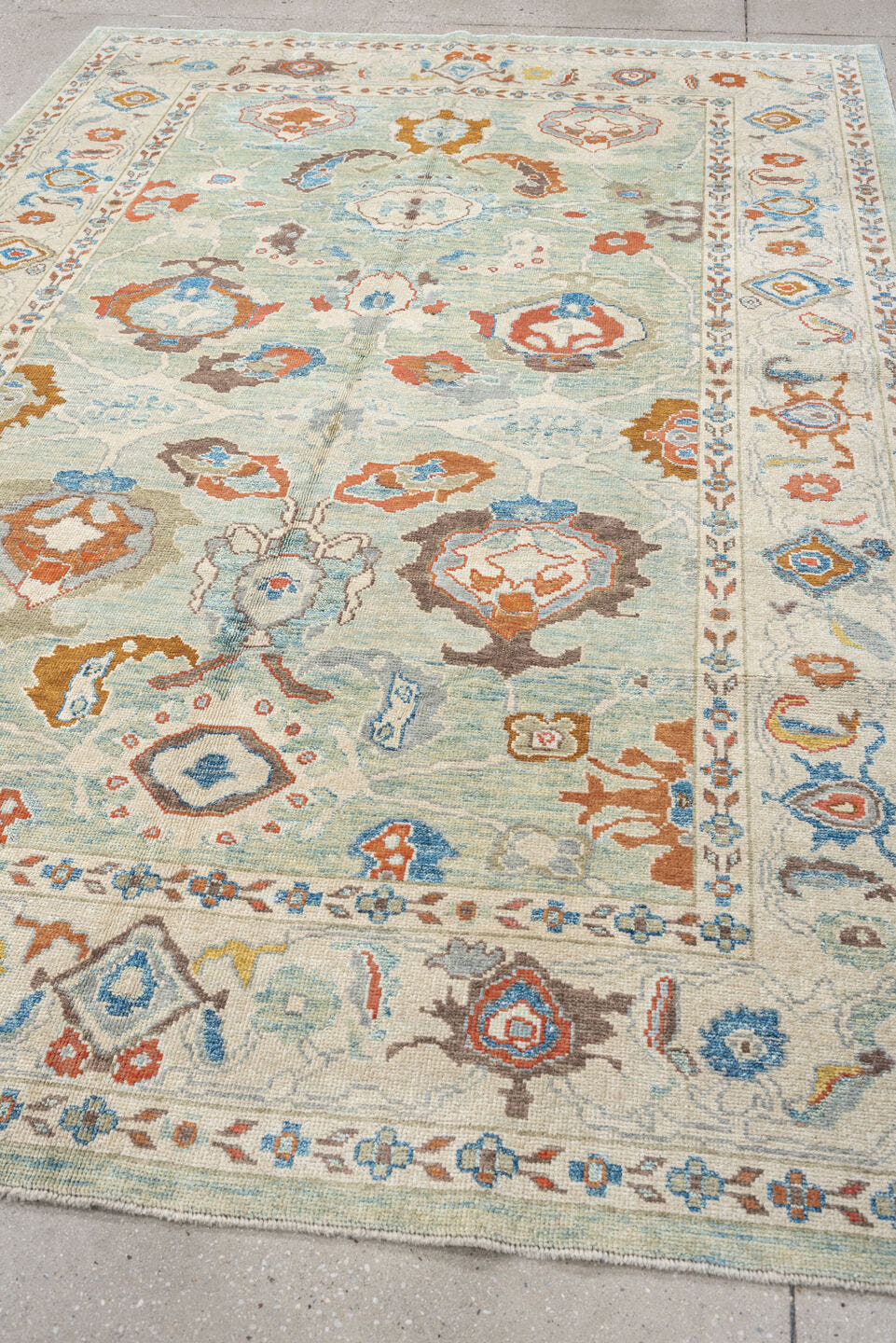 6' x 9' one-of-a-kind handmade vintage Sultanabad medium size rug. Color palette: pale aqua, ivory, coral, sky blue, taupe