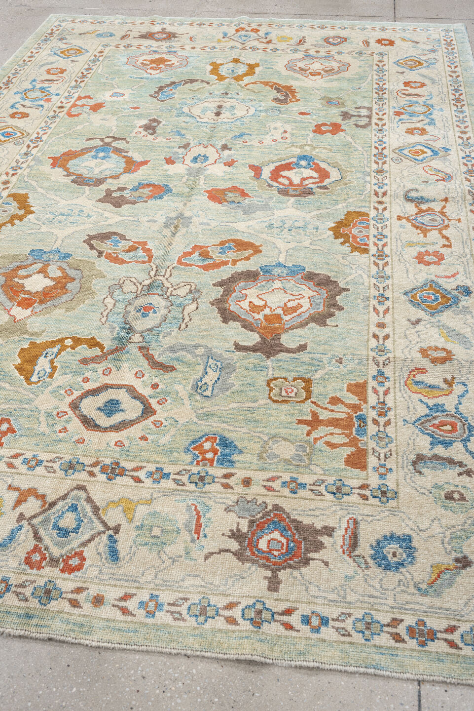 6' x 9' one-of-a-kind handmade vintage Sultanabad medium size rug. Color palette: pale aqua, ivory, coral, sky blue, taupe