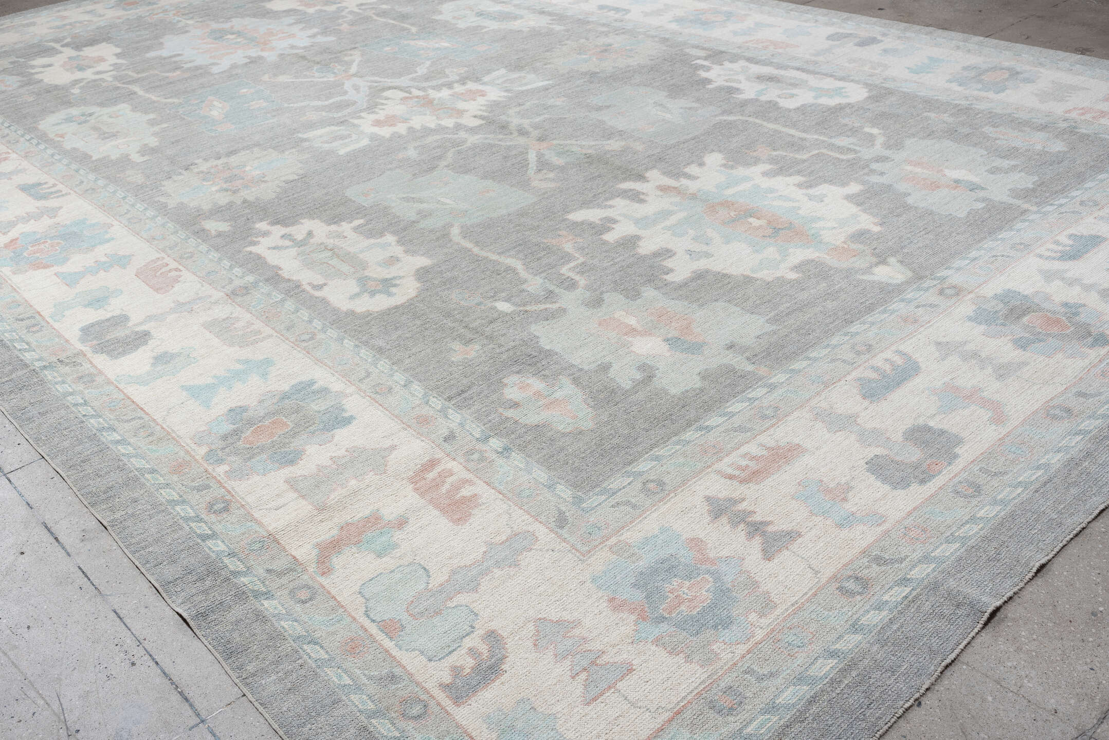 13' x 20' one-of-a-kind handmade vintage Oushak oversize rug. Color palette: pale blue, ivory, gray, blush, taupe
