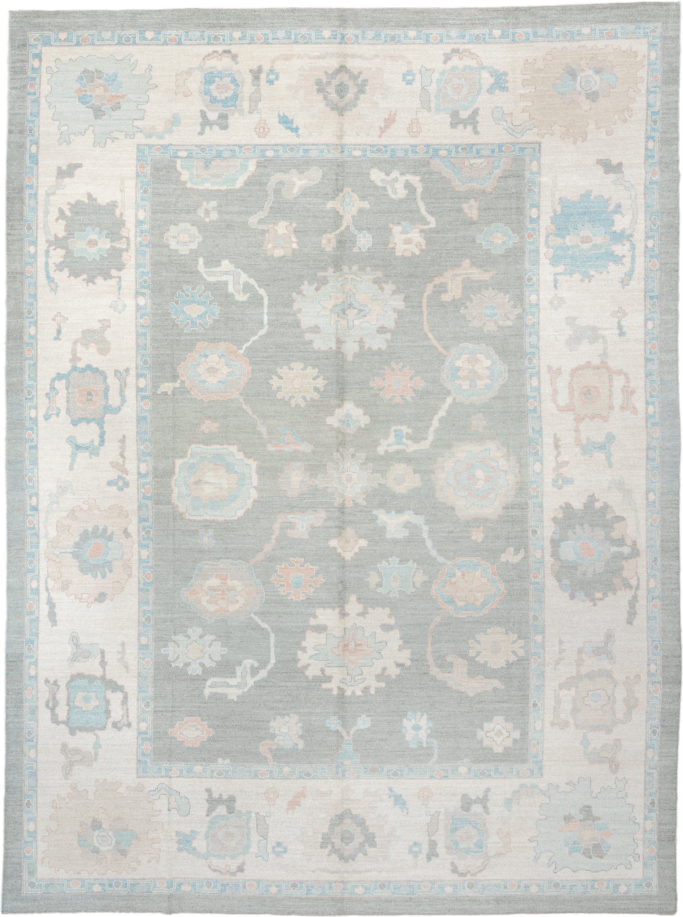 13' x 17' one-of-a-kind handmade vintage Oushak oversize rug. Color palette: pale blue, ivory, taupe, blush, cream, sky blue