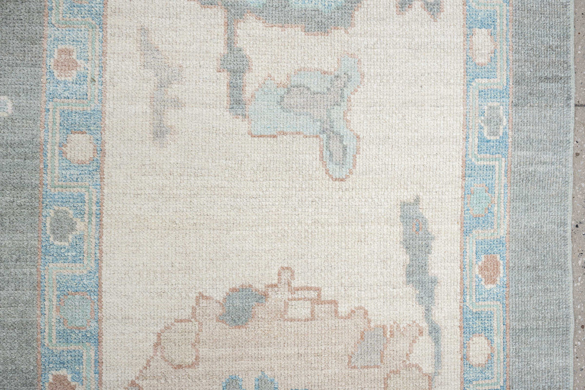13' x 17' one-of-a-kind handmade vintage Oushak oversize rug. Color palette: pale blue, ivory, taupe, blush, cream, sky blue