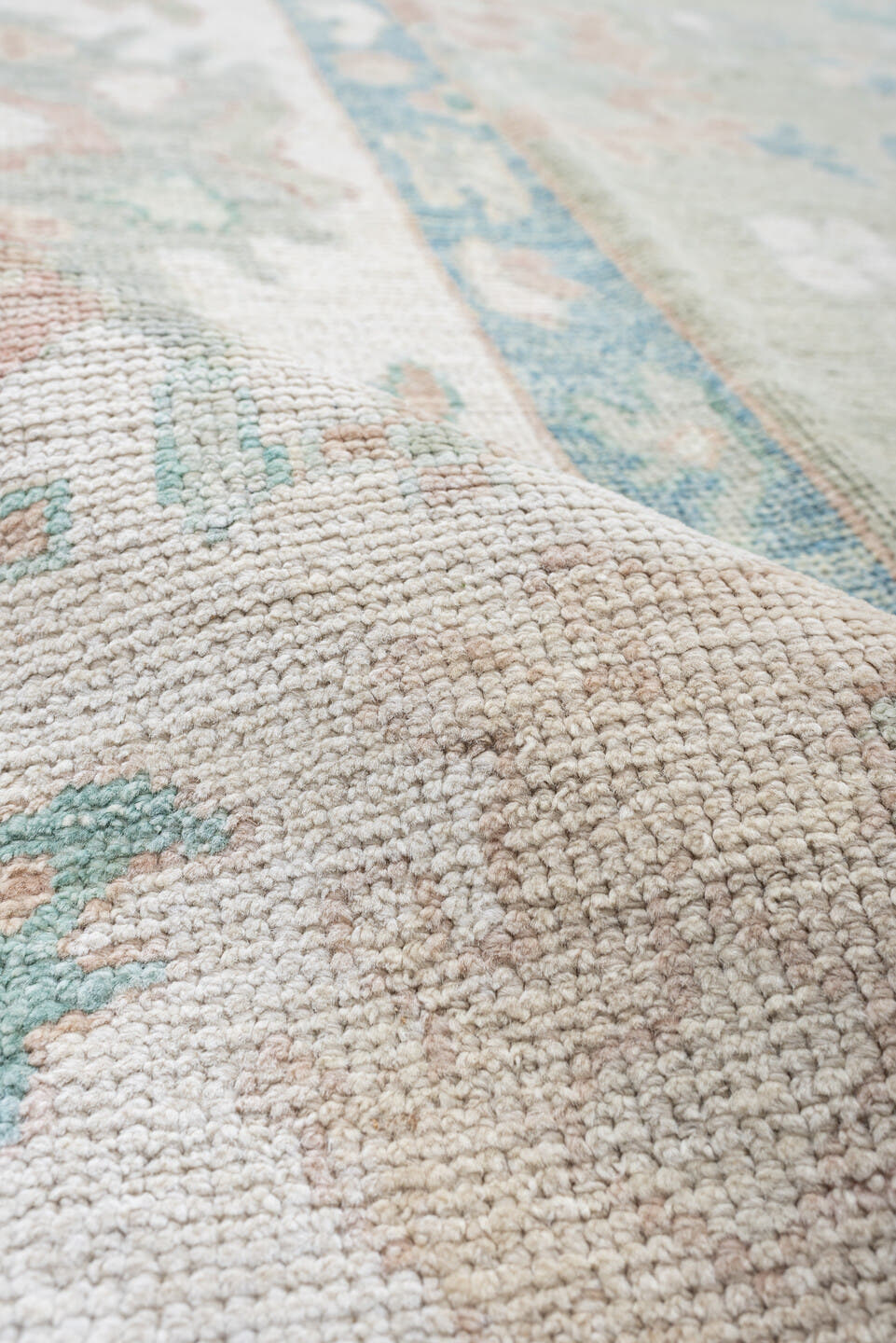 9' x 14' one-of-a-kind handmade vintage Oushak large size rug. Color palette: sage, ivory, sky blue, blush, taupe, cream