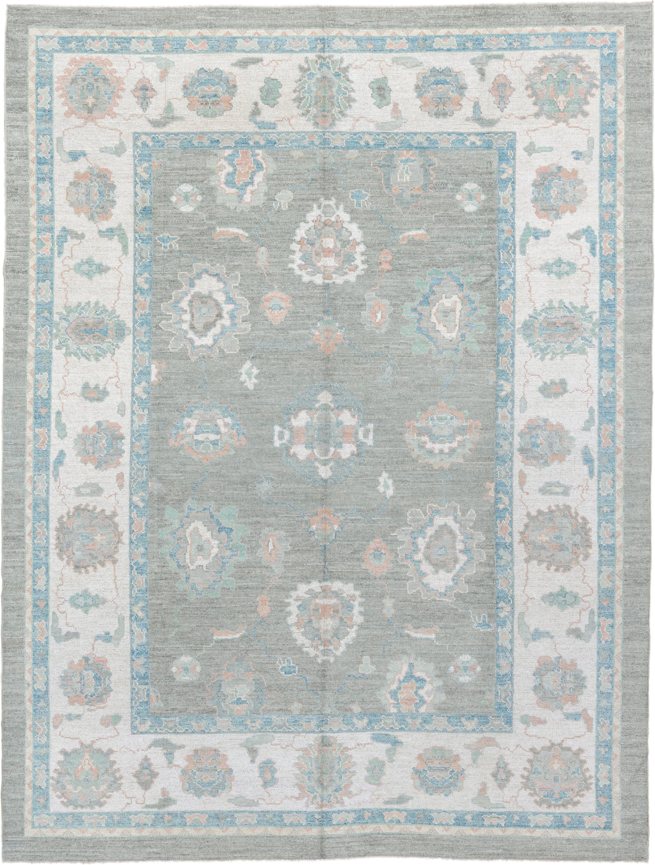 9' x 12' one-of-a-kind handmade vintage Oushak large size rug. Color palette: gray, ivory, sky blue, sage, blush, taupe